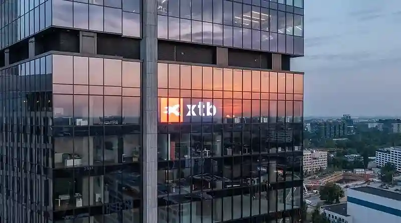 XTB Slips on Final $5.3M Fine Despite STOXX 600 Entry, Still Up 140% This Year