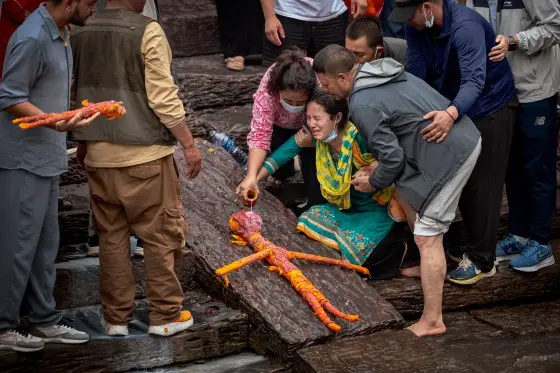 In Nepal, mourners hold symbolic cremation for missing loved ones