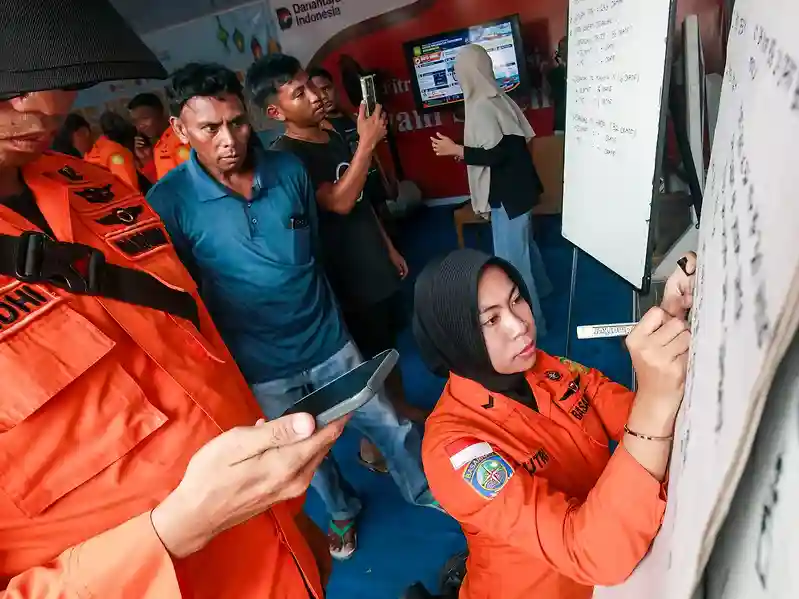 Rescuers search for about 130 missing people after Indonesia ferry capsizes
