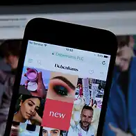 Boohoo owner Debenhams hails return to profit for first time in five years
