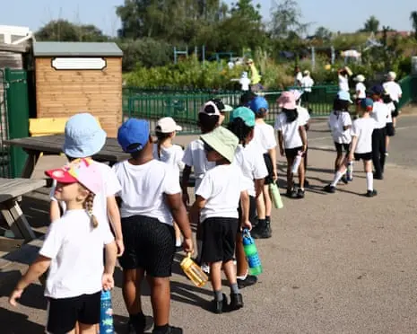 Retrofit schools and consider moving exams to beat extreme heat, says teaching union leader
