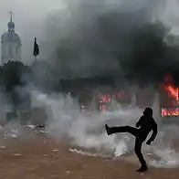 Protesters clash with police during nationwide demonstrations in France