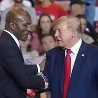 Trump praises supporter who punched heckler and compares him to Evander Holyfield