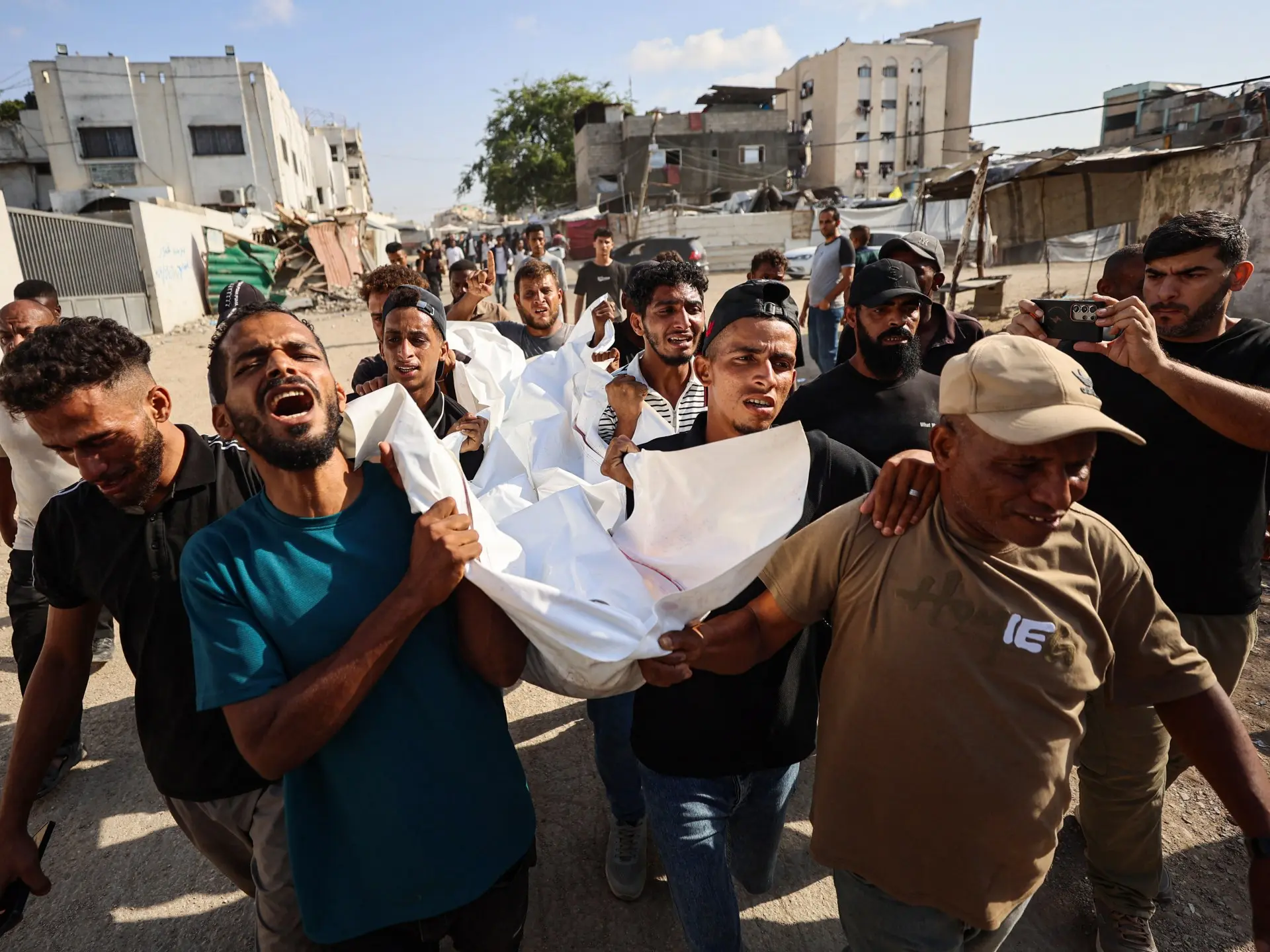 Eight killed in Gaza as Israel targets university campus and other sites
