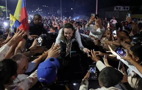 Exiled opposition leader María Corina Machado returns to rapturous reception in Venezuela