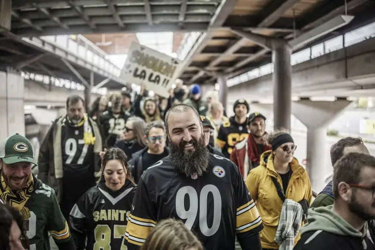 NFL fans visiting Paris in high spirits for Saints vs. Steelers game, undeterred by protests