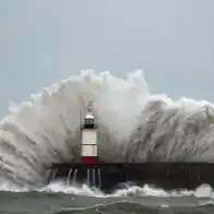 About 90,000 properties still without power after two storms strike Britain
