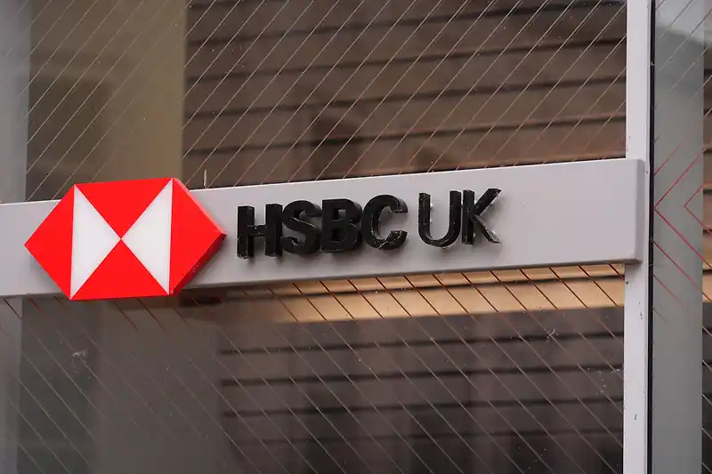 HSBC profits surge by a third as cost-cutting exceeds target