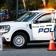 FBI raids Beverly Hills mansion in investigation into ex-Rep. Eric Swalwell