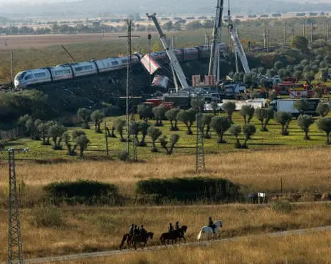 Spain begins mourning period after train crash as search continues for victims in wreckage