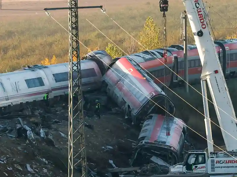 Rescue teams search wreckage for survivors after train crash in Spain