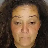 Georgia woman accused of walking into auto shop and leaving her baby with employees
