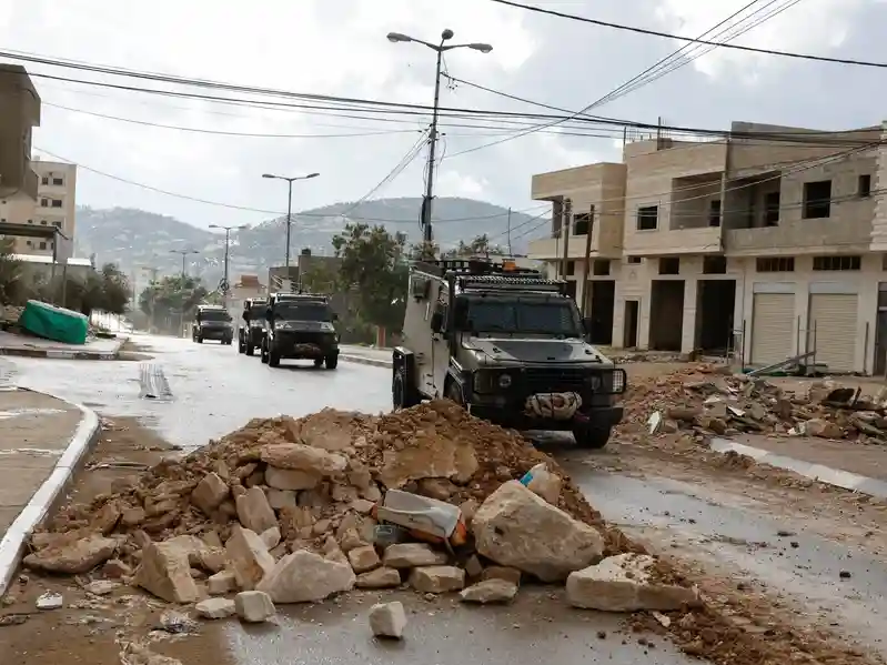 Israeli forces take over homes, impose lockdown on West Bank’s Qabatiya
